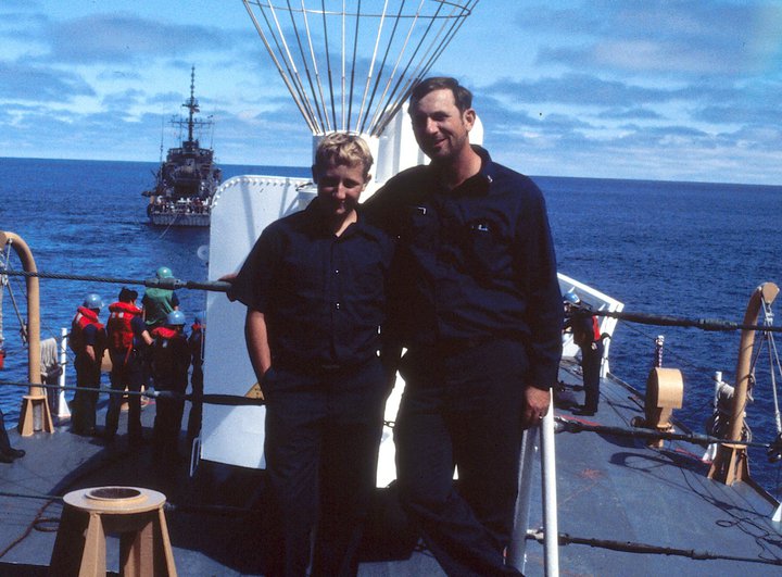 A young Chuck Colburn with his father aboard ship in Alaska